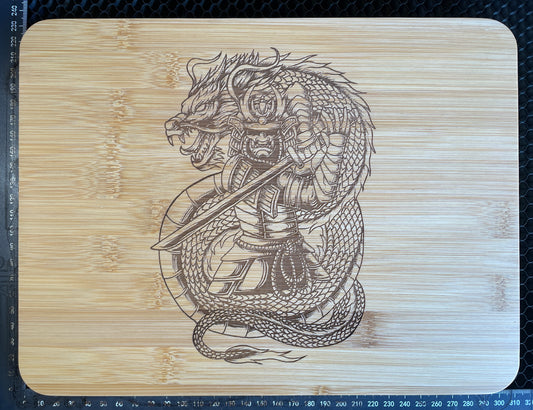 Samurai and Dragon laser engraved bamboo cutting board.